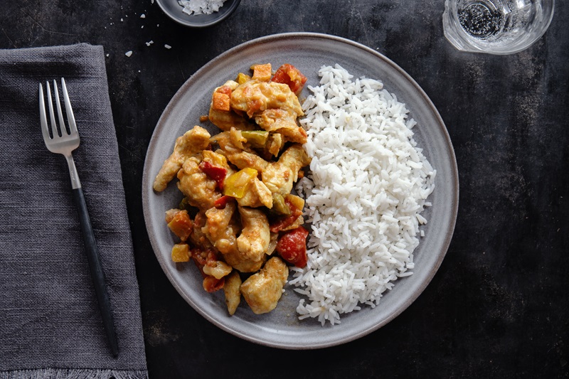 Balanced meal with grilled chicken, rice, and vegetables
